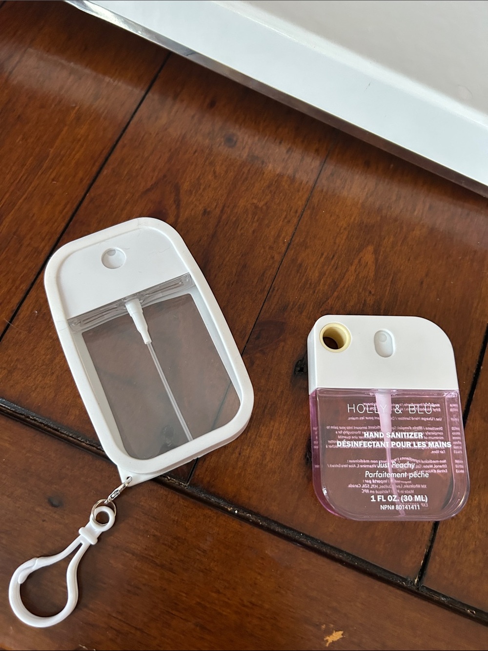 Refillable Pink Pocket Hand Sanitizer with White Carry Case and Clip
